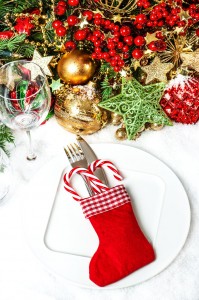 festive table place setting with christmas tree decoration
